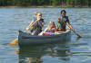 Three young girls in a canoe