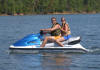 Jet skiers enjoy a moment of recreation at the lake