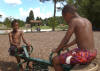 Two young visitors enjoy playing on the playground